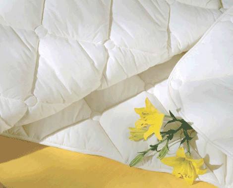 Под каким одеялом теплее всего спать?